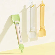 Reusable cat strip feeder spoon in pastel colors for dispensing lickable wet food for cats and dogs